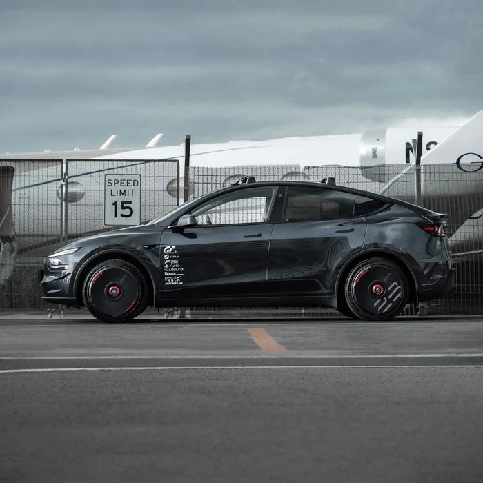 Tesla Model Y fitted with HALODISC 2 black wheel covers, full side profile