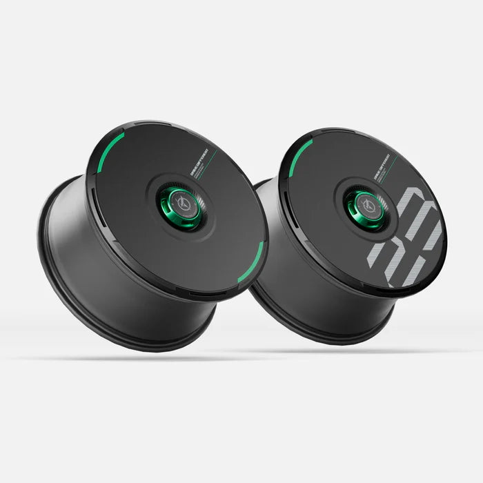Pair of HALODISC 2 black Tesla wheel covers with green accent rings